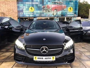 publié par HBIB AUTO - 👉C180 KIT AMG Pack night importer🚘❤️👌 - C180  KIT AMG BVA Toit Pano ouvrant   importer de l’Allemagne PRIX : 187 500 DT. ☎ 📱 Tel :                   98 214 267.//                   53 402 770 ⛔️ Pour les sérieux, Curieux s’abstenir. 🚫 S.V.P. Prix légèrement négociable. ✌🏠 Voiture visible dans notre Show Room HBIB AUTO : Route de la Marsa km 13 (en face carrefour) Sidi Daoud Tunis pour visite. Heure travail de 10.00 H jusqu’à 18.00.H 👉 🆕 A Vendre ou à echange 🚘 C180 KIT AMG BVA Toit Pano ouvrant fulls options importer de l’Allemagne 👌 ☑interieur en cuir noir ☑➡Mise en circulation 1/2019. ☑➡Kilométrage : 47 000 km seulement ☑➡Energie : essence ☑➡Couleur extérieure noir présidentiel ☑➡Designe intérieur : tout en cuir noir ☑➡(BOITE VITESSE AUTOMATIQUE). ☑➡Puissance fiscal : 9 CV. ✅➡Kit AMG à l’intérieur et à l’extérieur de la voiture. ✅➡Boite vitesse automatique. ✅➡Camera de recul. ✅➡Bi xénon directionnel.avec lave phare ✅➡Sièges électriques AMG chauffant. ✅➡Volant en cuir multifonctions . ✅➡Rétroviseurs rabattables électriques chauffants. de couleur noir ✅➡Climatisation automatique bi zone. ✅➡Vitres teintées  d’origine.✅➡Feux de jours auto LED avec Angel Eyes. ✅➡Capteur de stationnement avant et arrière. ✅➡detecteur d’obscurite’ 1 ✅➡Jantes AMG en noir 18″ avec des pneus RunFlat neuf ✅➡Lave glace auto. ✅➡Bluetooth, Prise audio auxiliaire, Prise 12v ,Prise USB, Système audio mp3. ✅➡ Système de sonorisation Surround ✅➡ Interface multimédia caméra de recul ✅➡Ordinateur de bord avec souris qui affiche toutes les options de la voiture avec ses défauts ✅➡Voiture première main très très propre comme neuve.TU 221 🚗🚙🚕🚗🚙🚕🚗🚙🚕🚗🚙🚕🚗🚙🚕🚗🚙🚕🚗🚙🚕🚗🚙🚕🚗 ₪ 💰💲 Prix 187 000 DT ₪🚫 S.V.P. Prix légèrement négociable. ₪⛔️ S.V.P. Curieux s’abstenir. ₪☎ 📱 Tel :  98 214 267.//  53 402 770 
Possibilité d'échange - Voitures