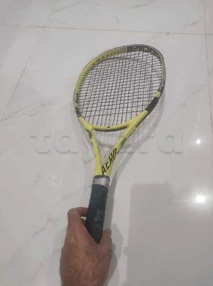 Raquette Tennis Babolat taille25.

Tel 99455258