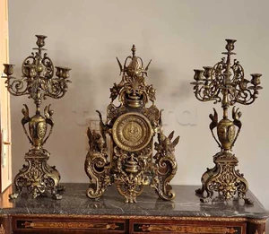 deux chandelier et une montre geante en cuivre importe de italy hauteur 75cm 