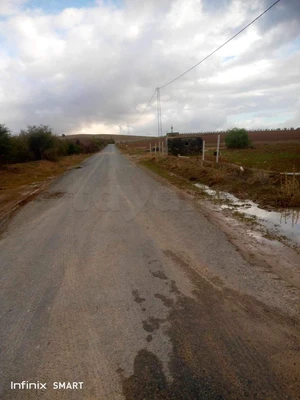 un terrain nu d'agricole a vendre situé a jedaida Chawat sur la route principale