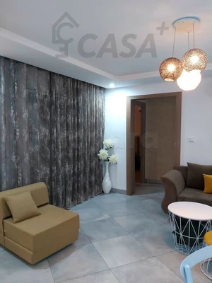 City Casa met pour la Vente  Un appartement S+1 très haut standing dans une résidence calme et sécurisée avec piscine bien placé à citer El Wafa Hammamet Nord.