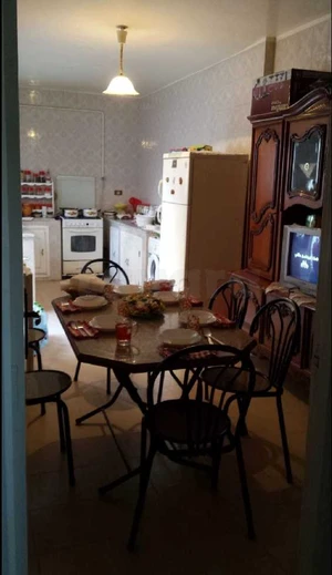 Table cuisine et 6 chaises
Living merisier